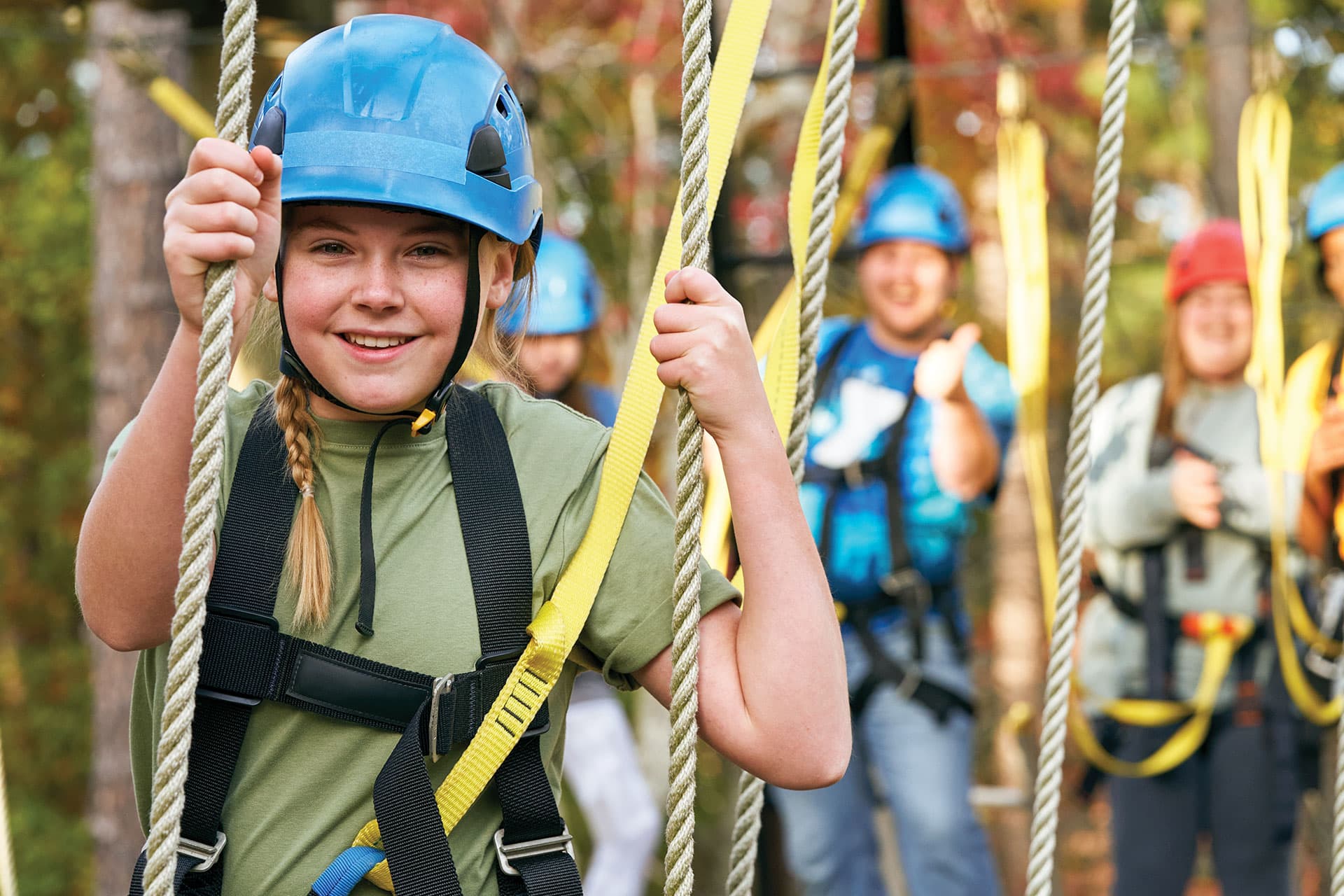 Kids on rope bridge at camp